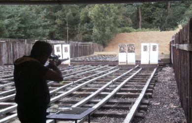 Alumnus shoots his way to two gold medals