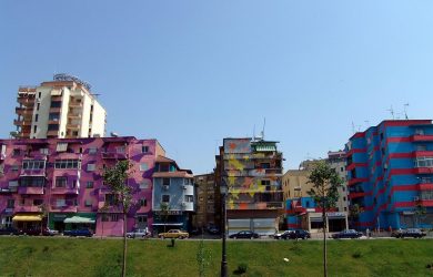 From Tirana via London