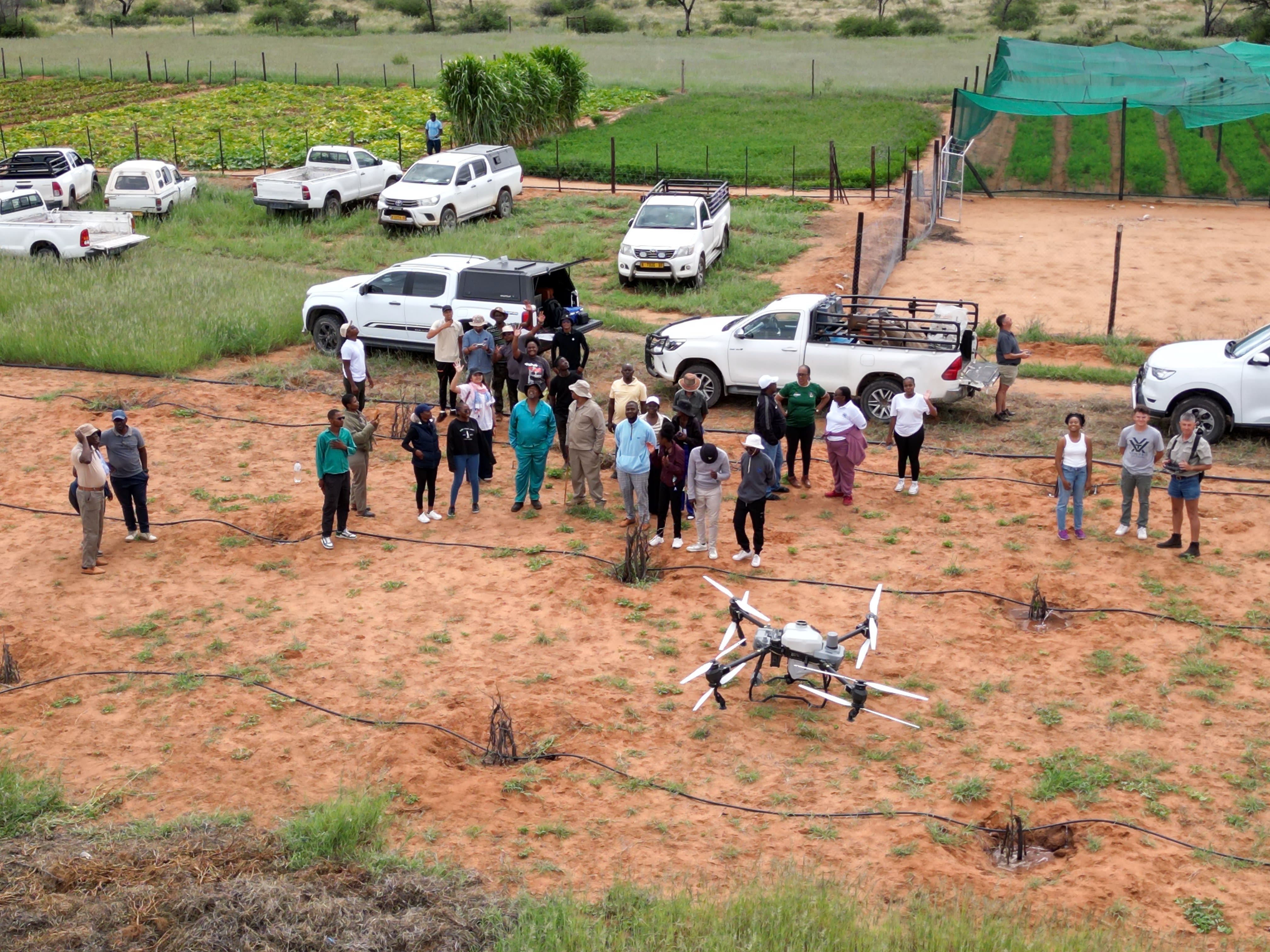 Farmers with drone