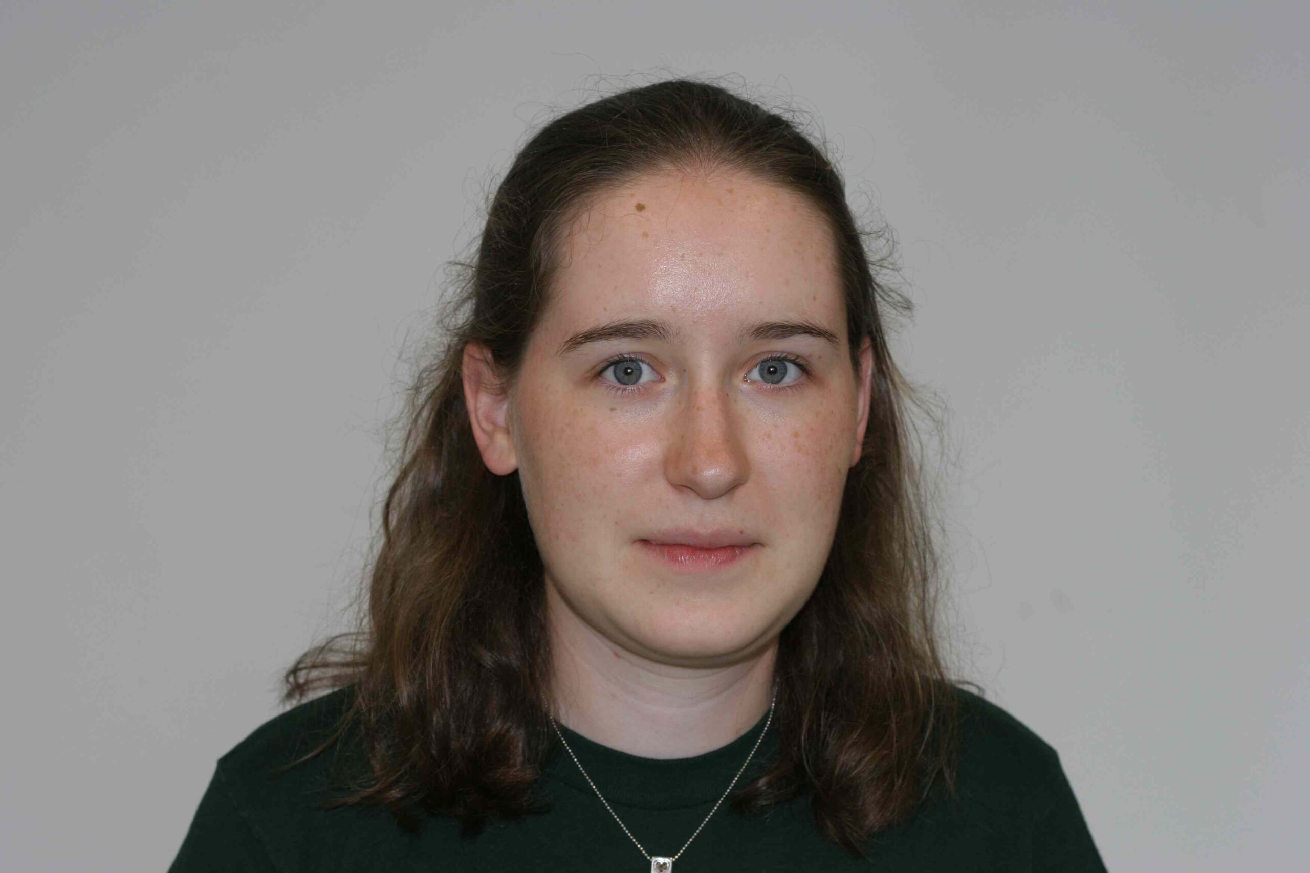 Headshot of woman with long hair