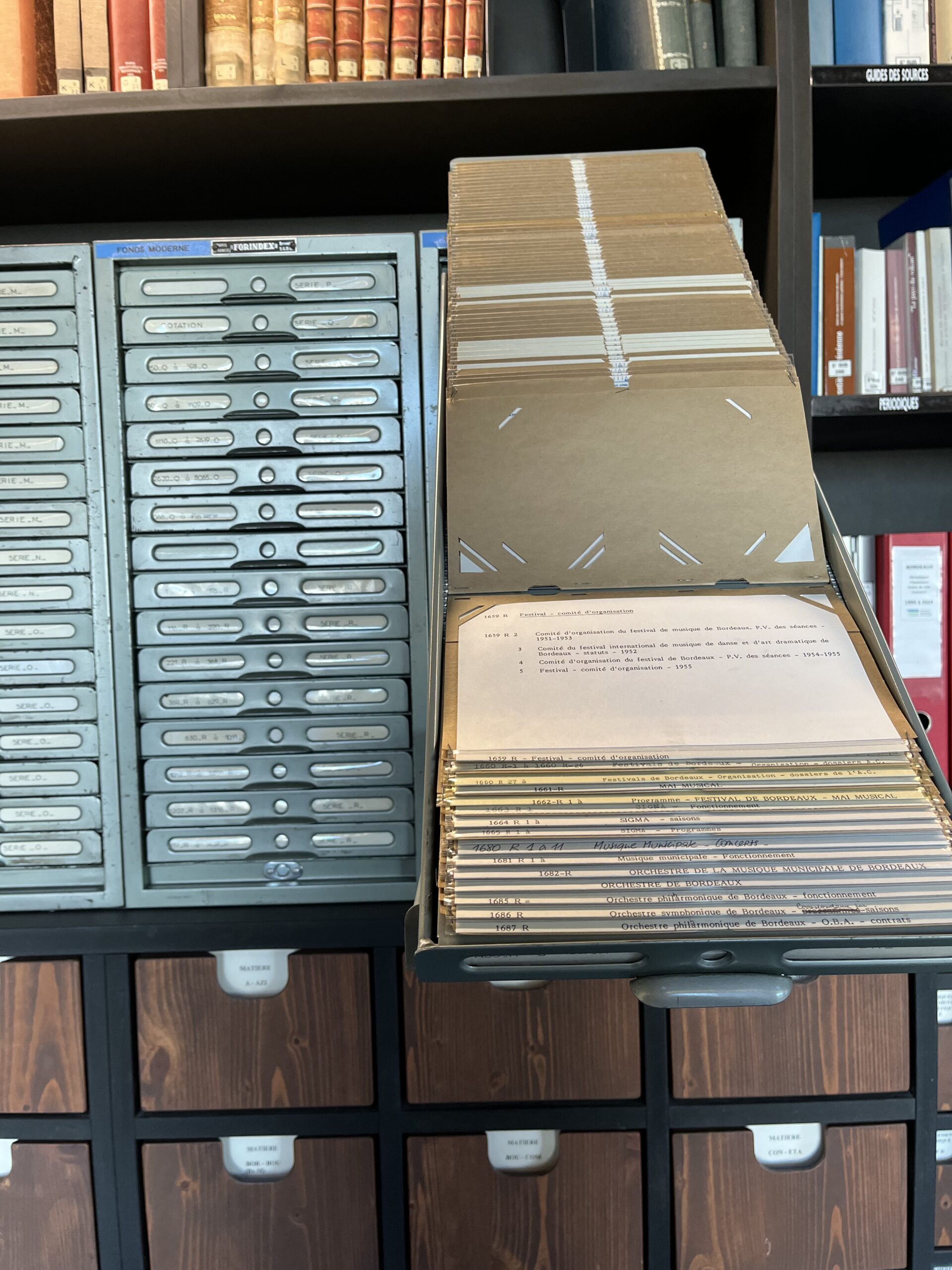 Files of papers in drawers and bundles